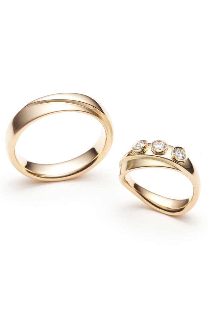 Set of rings for women and men in 18-carat yellow gold, set with diamonds