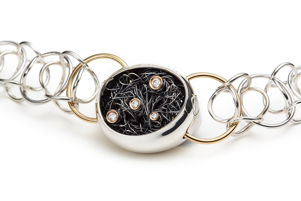 Sterling silver and 18-carat yellow gold necklace, set with Canadian diamonds