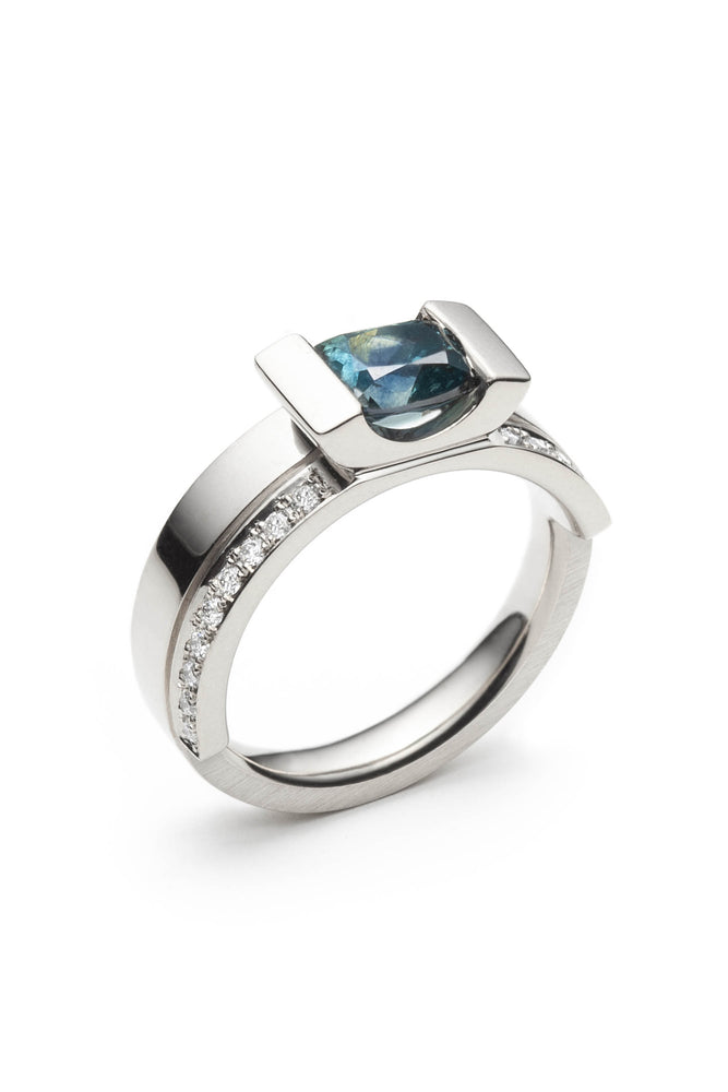 18 karat white gold ring set with a Montana sapphire and Canadian diamonds